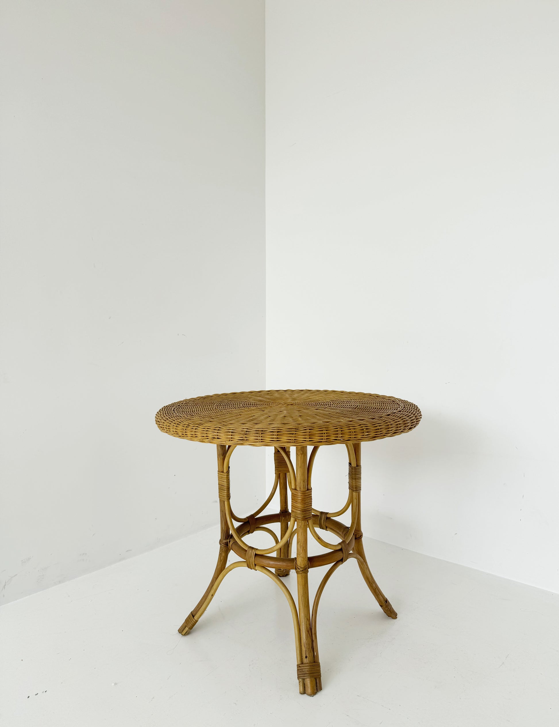 Round woven rattan table, 1960