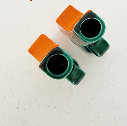 Pair of CAR Florence ceramic vessels, 1960s
