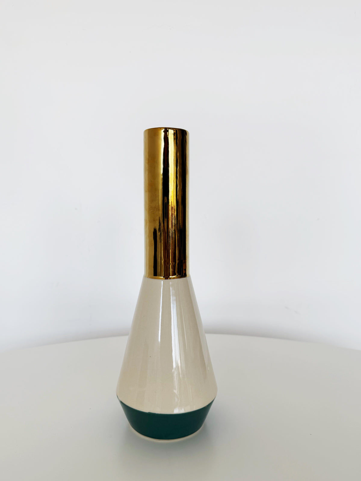 Decorative ceramic vase with gold accents