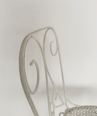 Pair of vintage wrought iron garden chairs