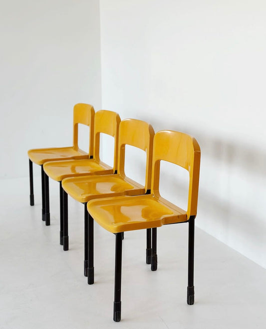 Four Grosfillex chairs