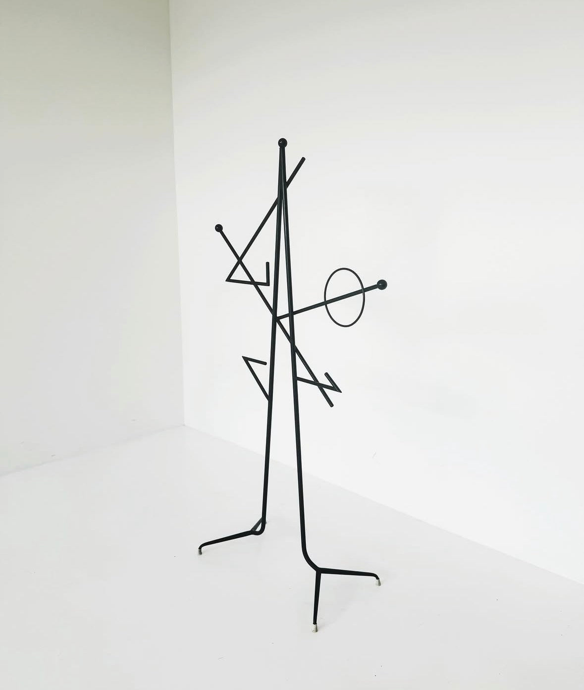 Iron rod floor coat rack