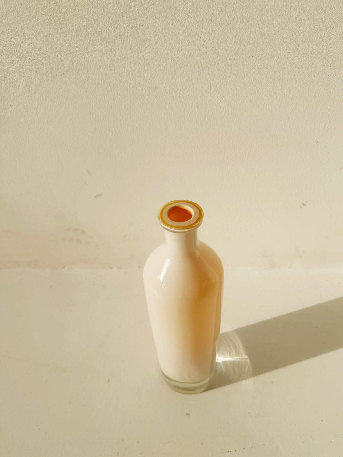 Decorative, narrow-necked bottle