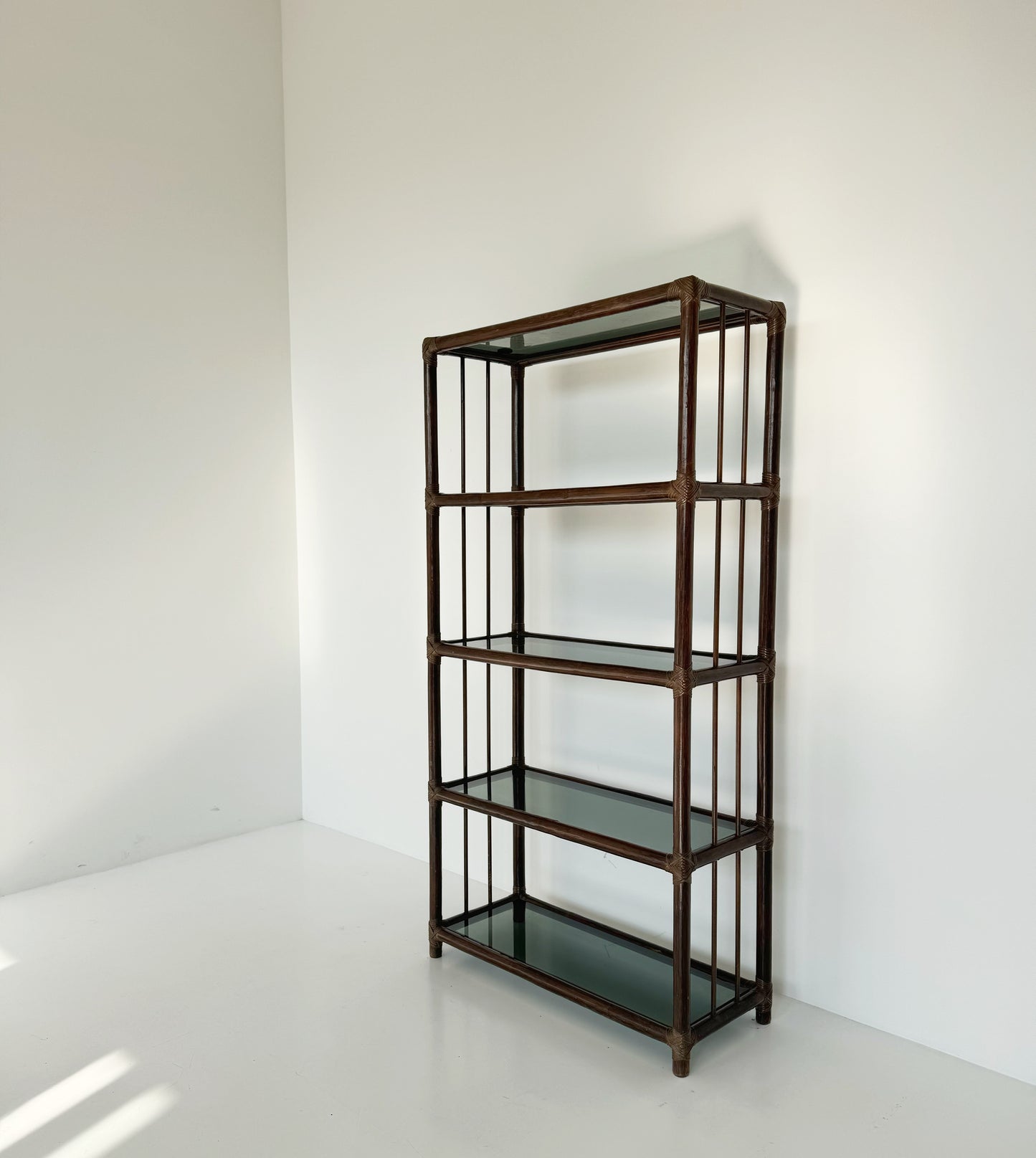 Wicker and glass bookcase