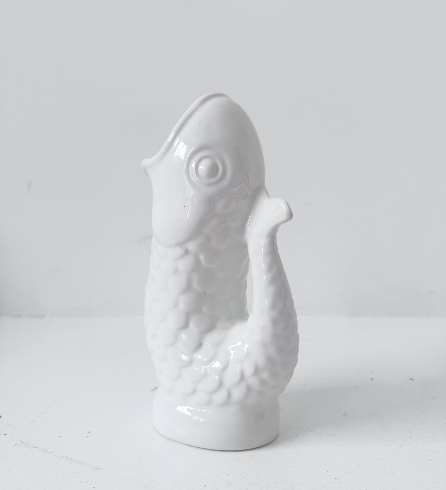 Vintage fish-shaped pitcher signed by Costa – White glazed ceramic