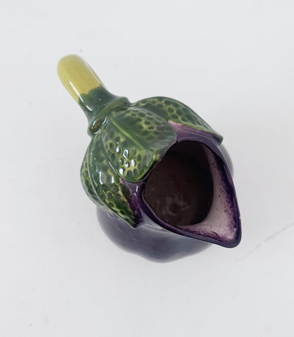 Glazed ceramic pitcher shaped like an eggplant