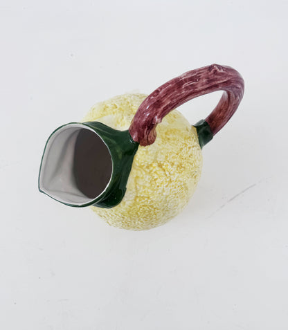 Glazed ceramic lemon-shaped pitcher