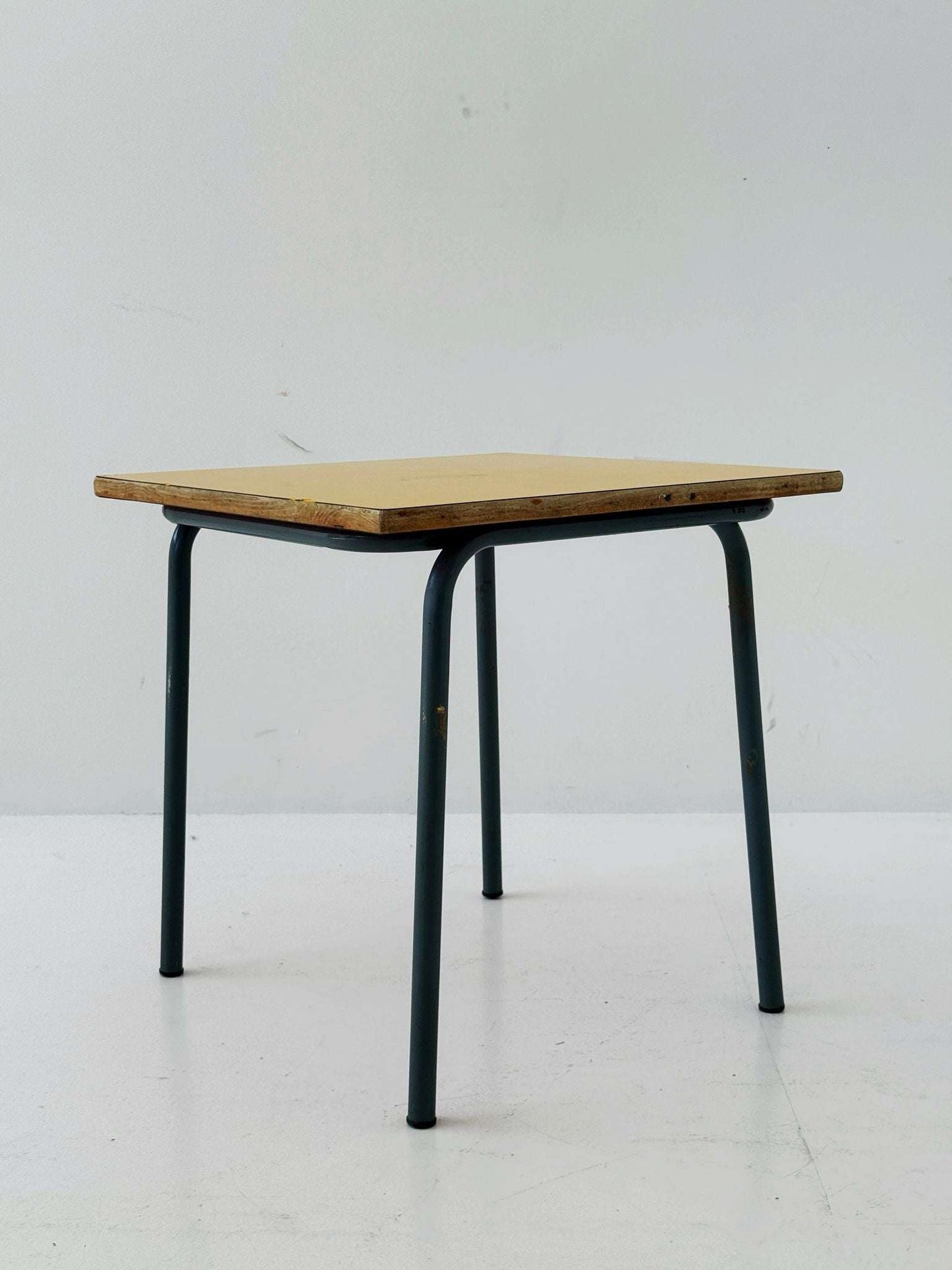 1960s coffee table with yellow top and metal frame