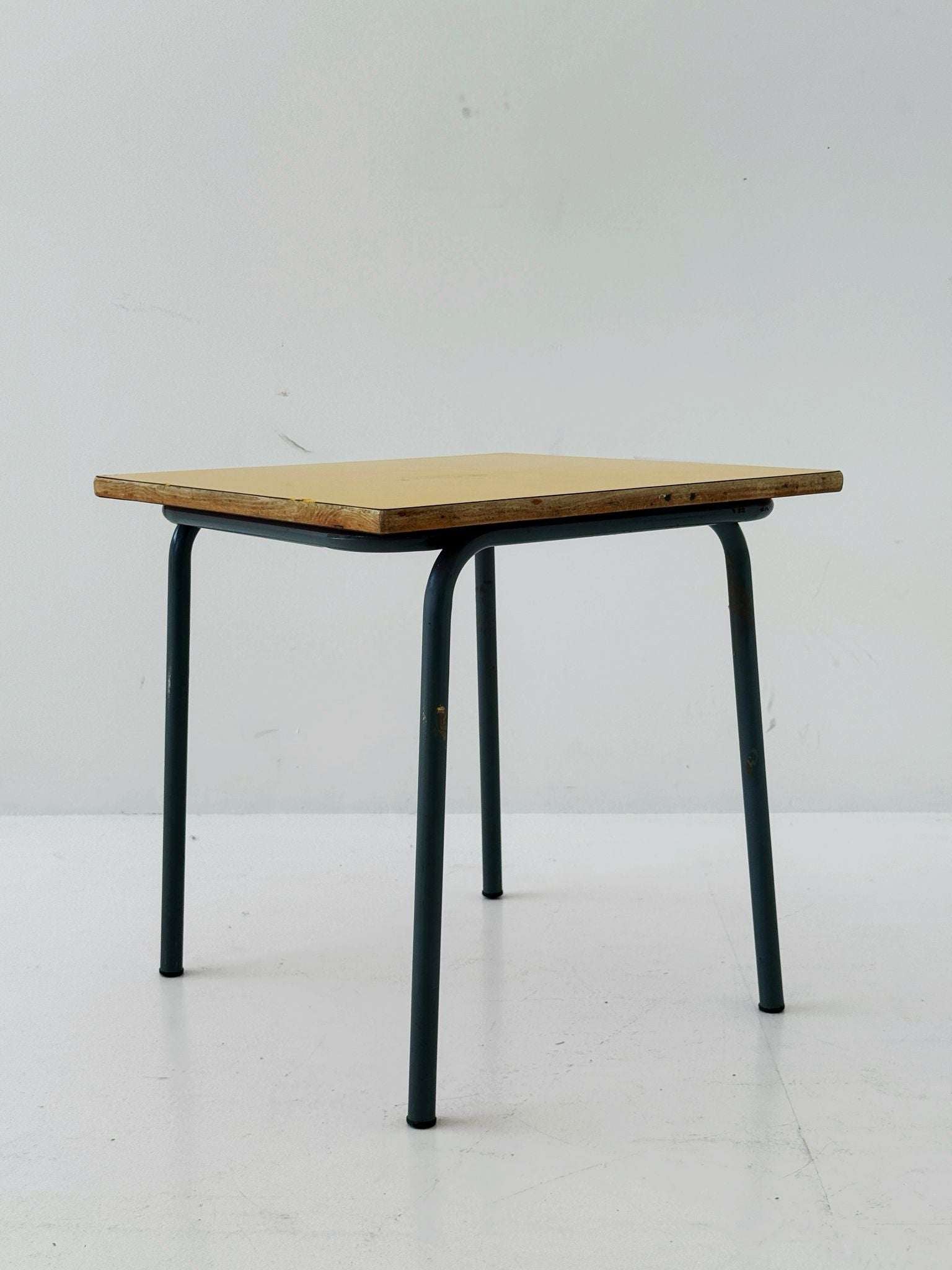 1960s coffee table with yellow top and metal frame