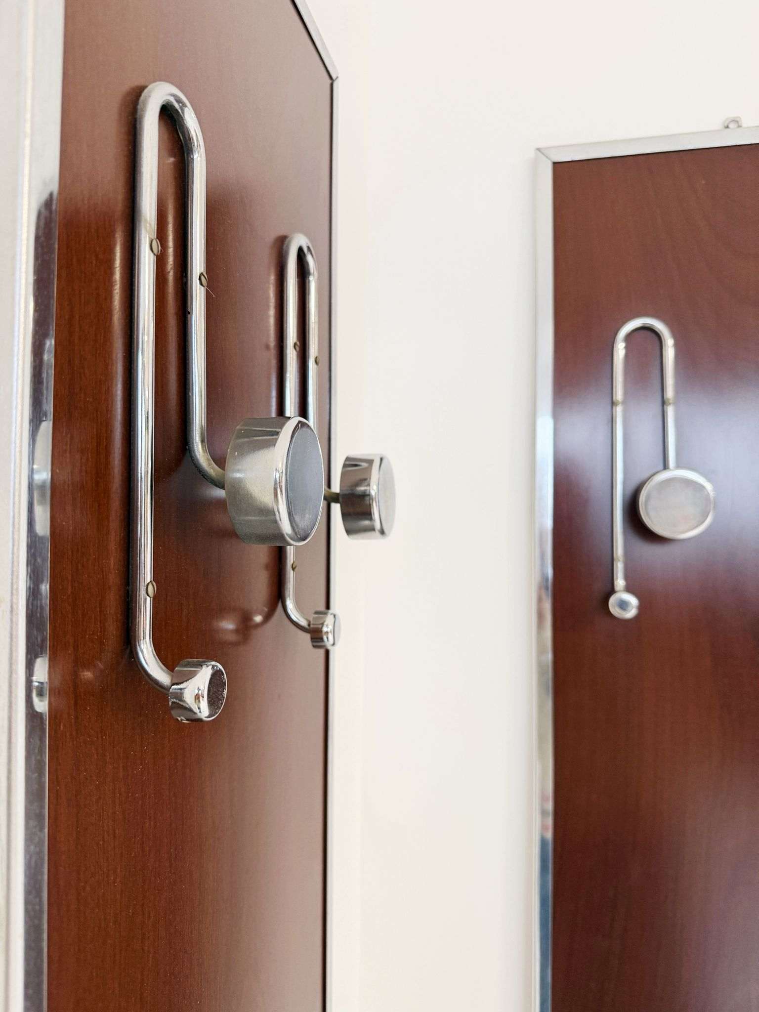 Pair of elegant wall coat hangers from the 1960s and 1970s