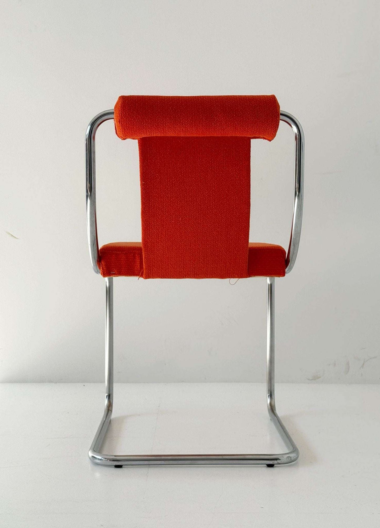 1970s chair in chromed metal and orange fabric