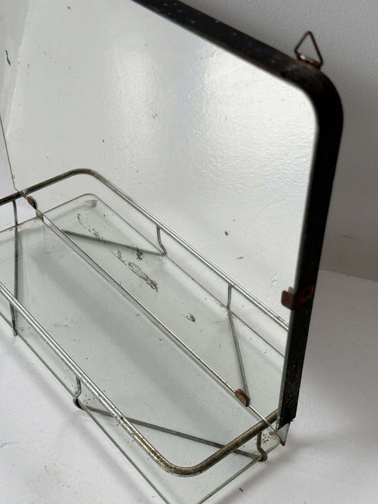 Small wall mirror with glass shelf