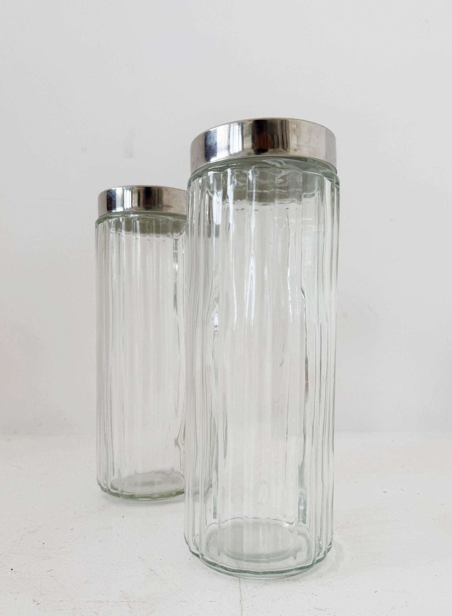 Pair of blown glass jars with metal lids, 1960s–1970s