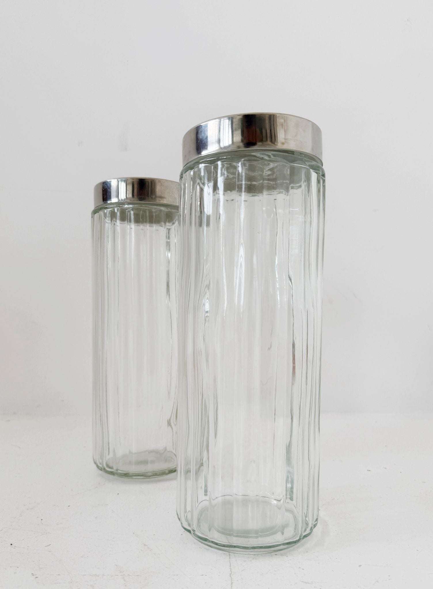 Pair of blown glass jars with metal lids, 1960s–1970s