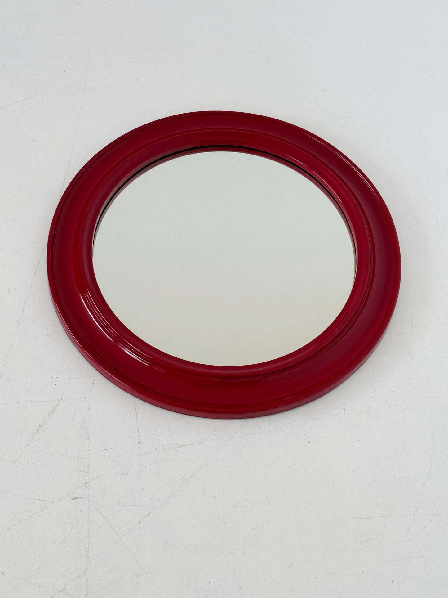 Round mirror with red lacquered wooden frame, 1970s