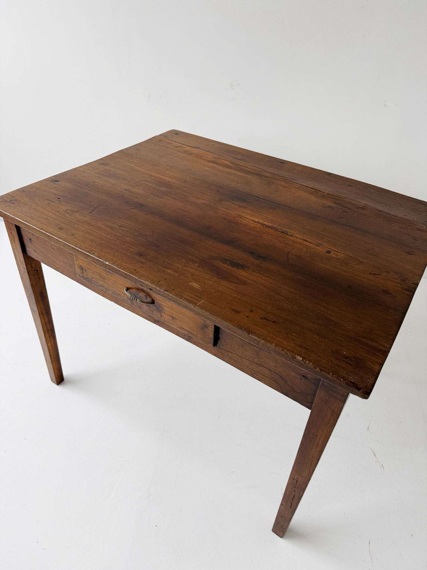 Directoire walnut table with central drawer, Italy, late 18th century
