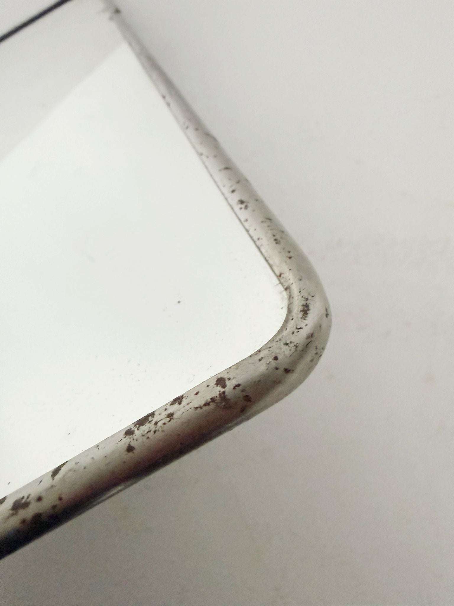 Rectangular mirror with metal frame