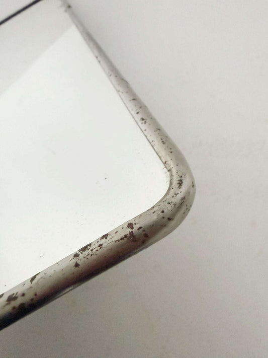 Rectangular mirror with metal frame
