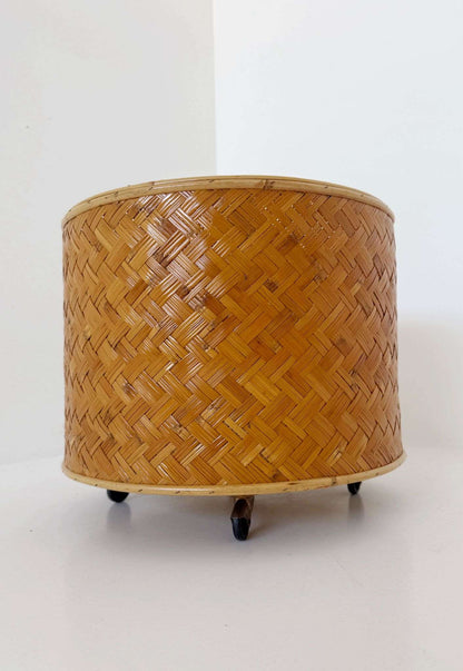 Woven wicker flower stand with wheels