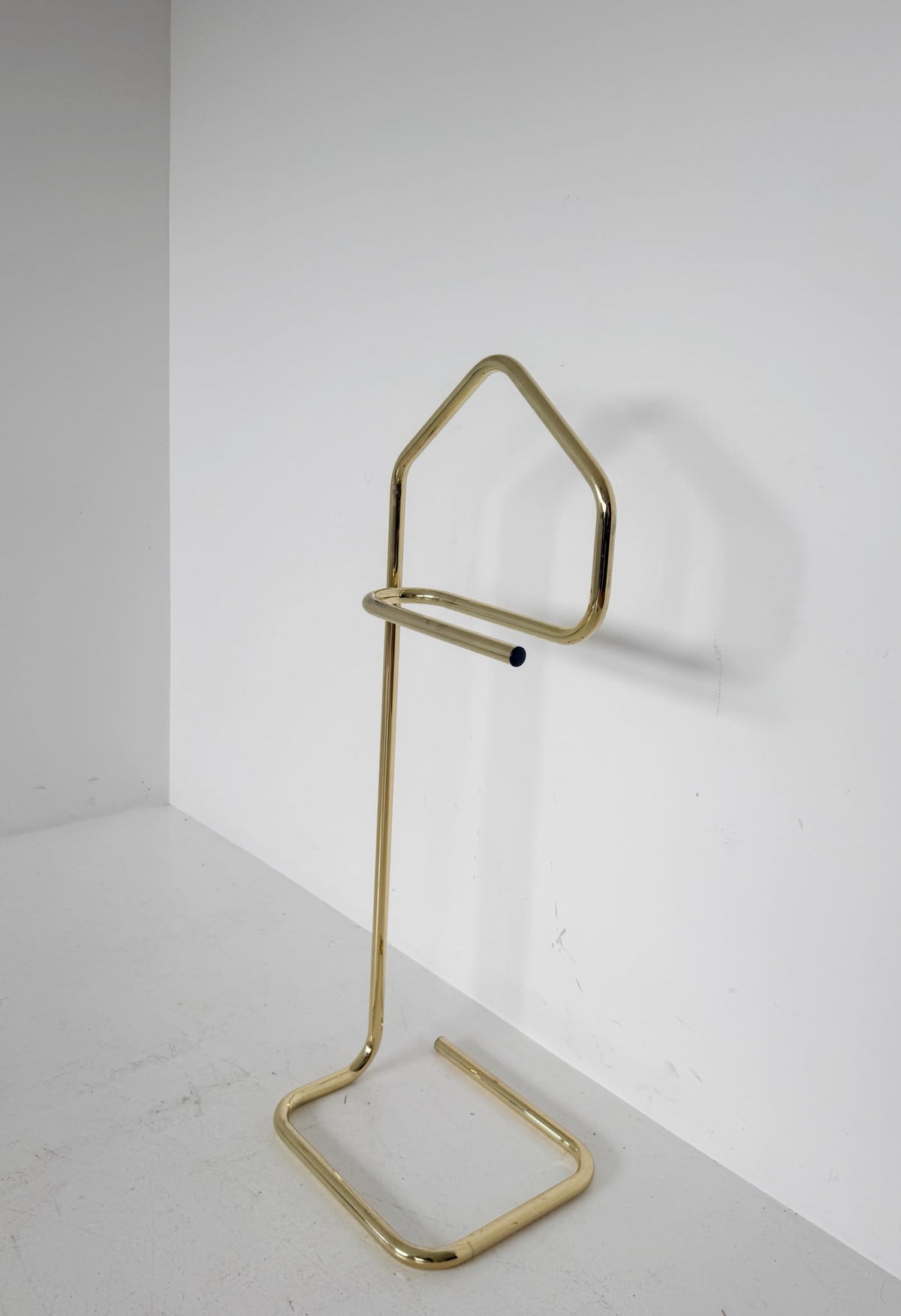 Gold-tone metal valet stand, 1960