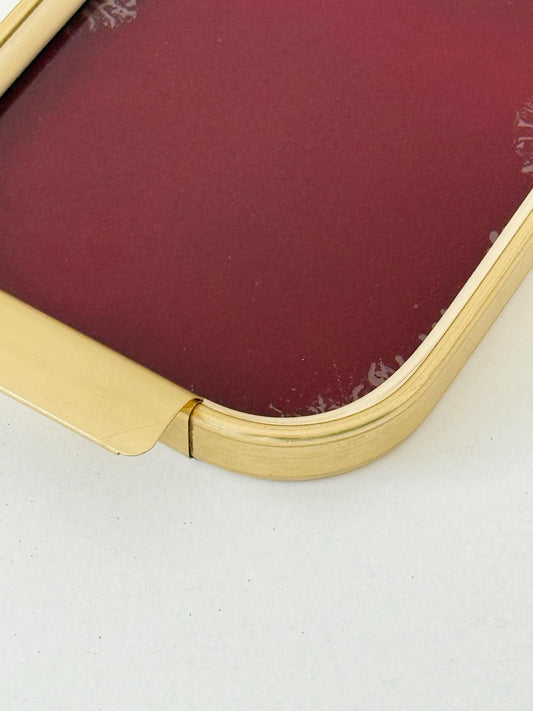 Vassoio in metallo dorato e vetro bordeaux, anni ’50-’60
