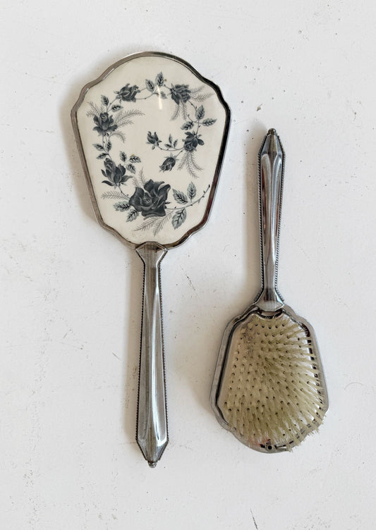 Coppia vintage da toilette: specchietto e spazzola con decoro floreale