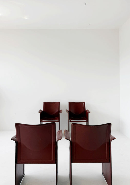 Set di quattro poltrone Matteo Grassi in pelle bordeaux, anni '80