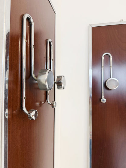 Pair of elegant wall coat hangers from the 1960s and 1970s