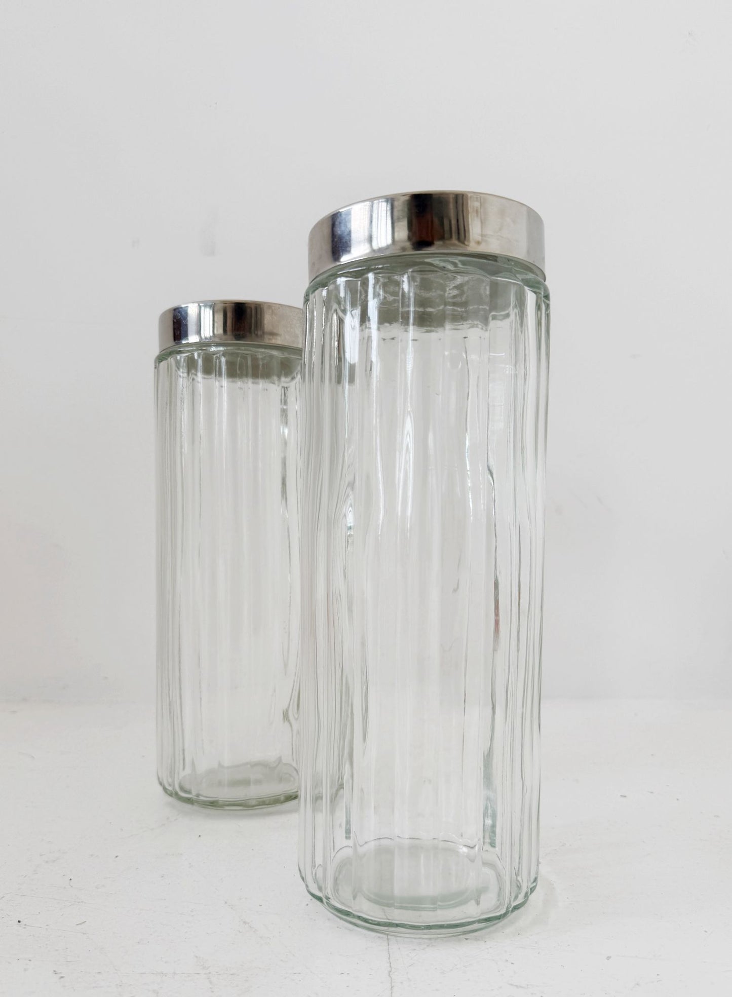 Pair of blown glass jars with metal lids, 1960s–1970s
