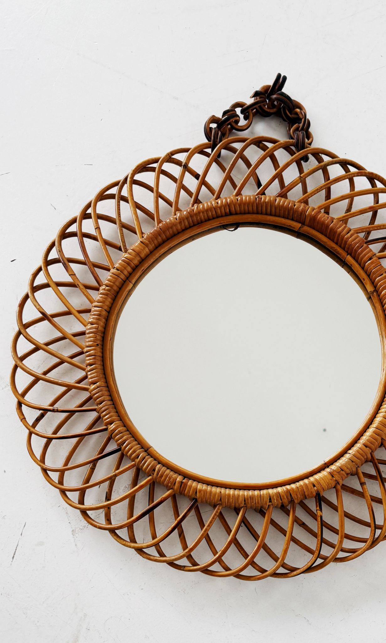 Oval rattan mirror – attributed to Bonacina (attr.)