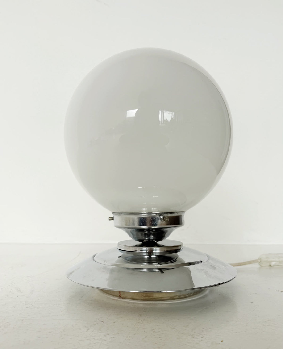 Spherical table lamp in opal glass and chrome-plated metal – 1970s
