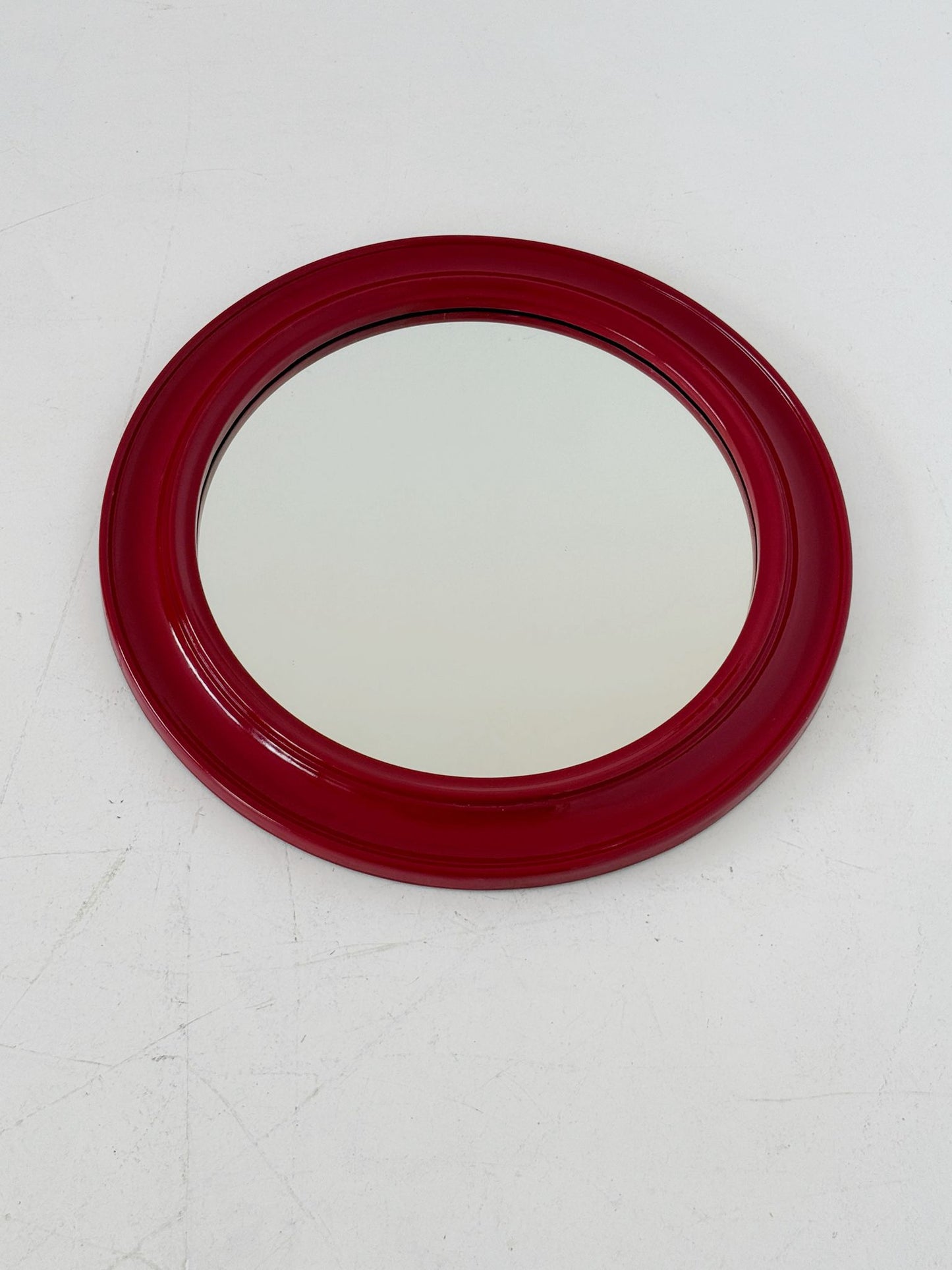 Round mirror with red lacquered wooden frame, 1970s