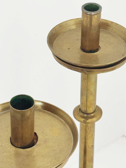 Pair of brass candelabra, circa 1950s – architectural stepped line