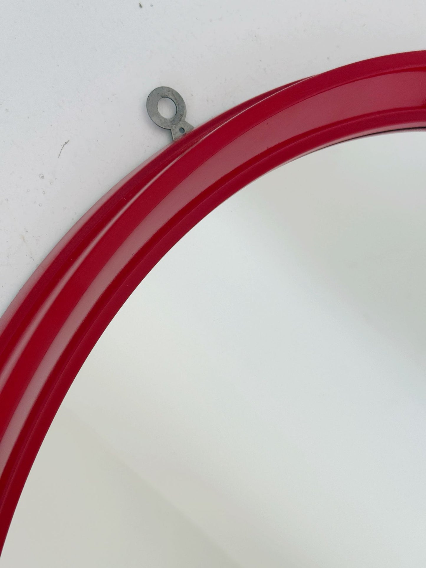 Round mirror with red lacquered frame – 1960