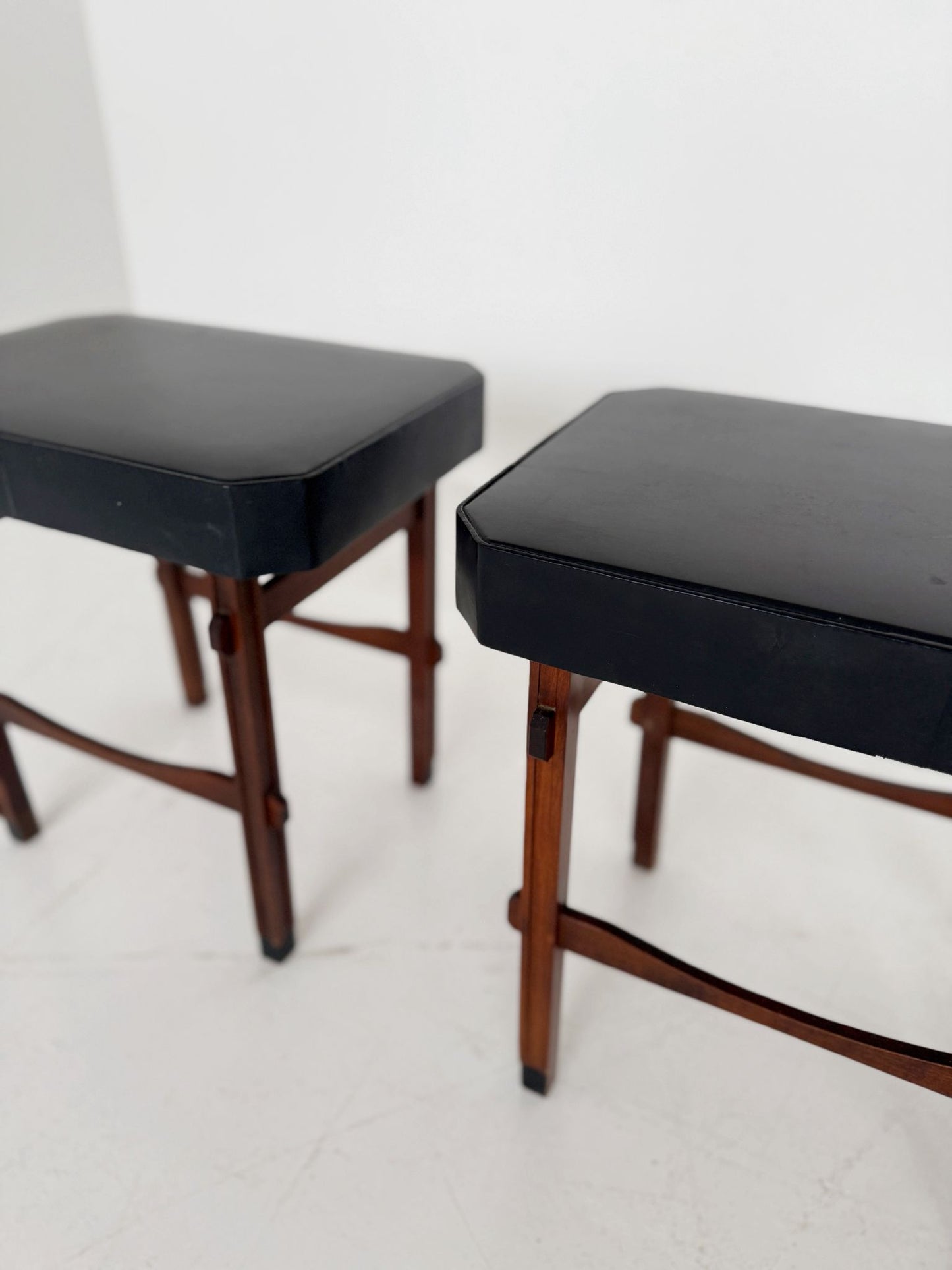 Pair of stools/seats in wood and black vinyl, 1950s–1960s