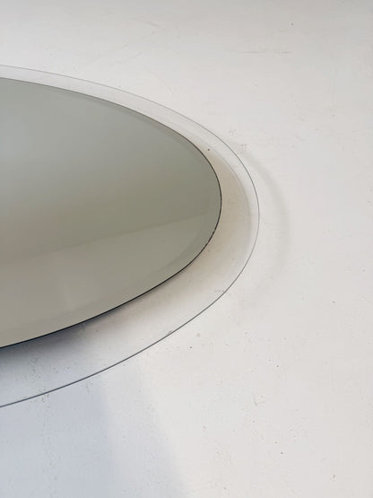 Oval mirror with clear glass frame (c. 1970s)