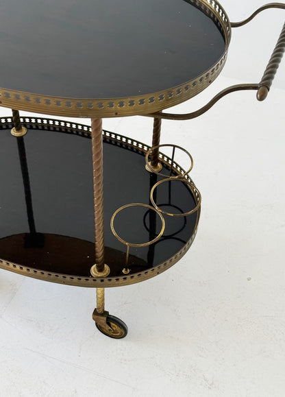 Oval brass and lacquered wood bar cart, 1950s/60s