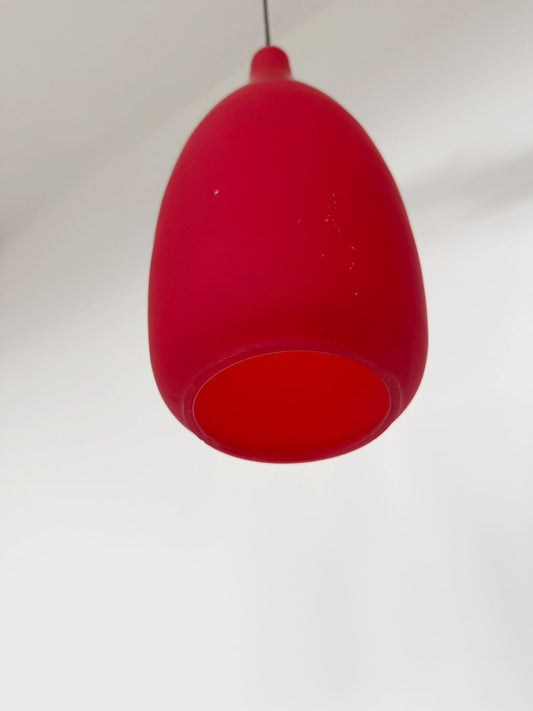 A pendant lamp with a simple, sculptural profile