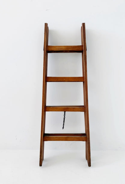 Wooden A-frame ladder with iron hardware, mid-20th century
