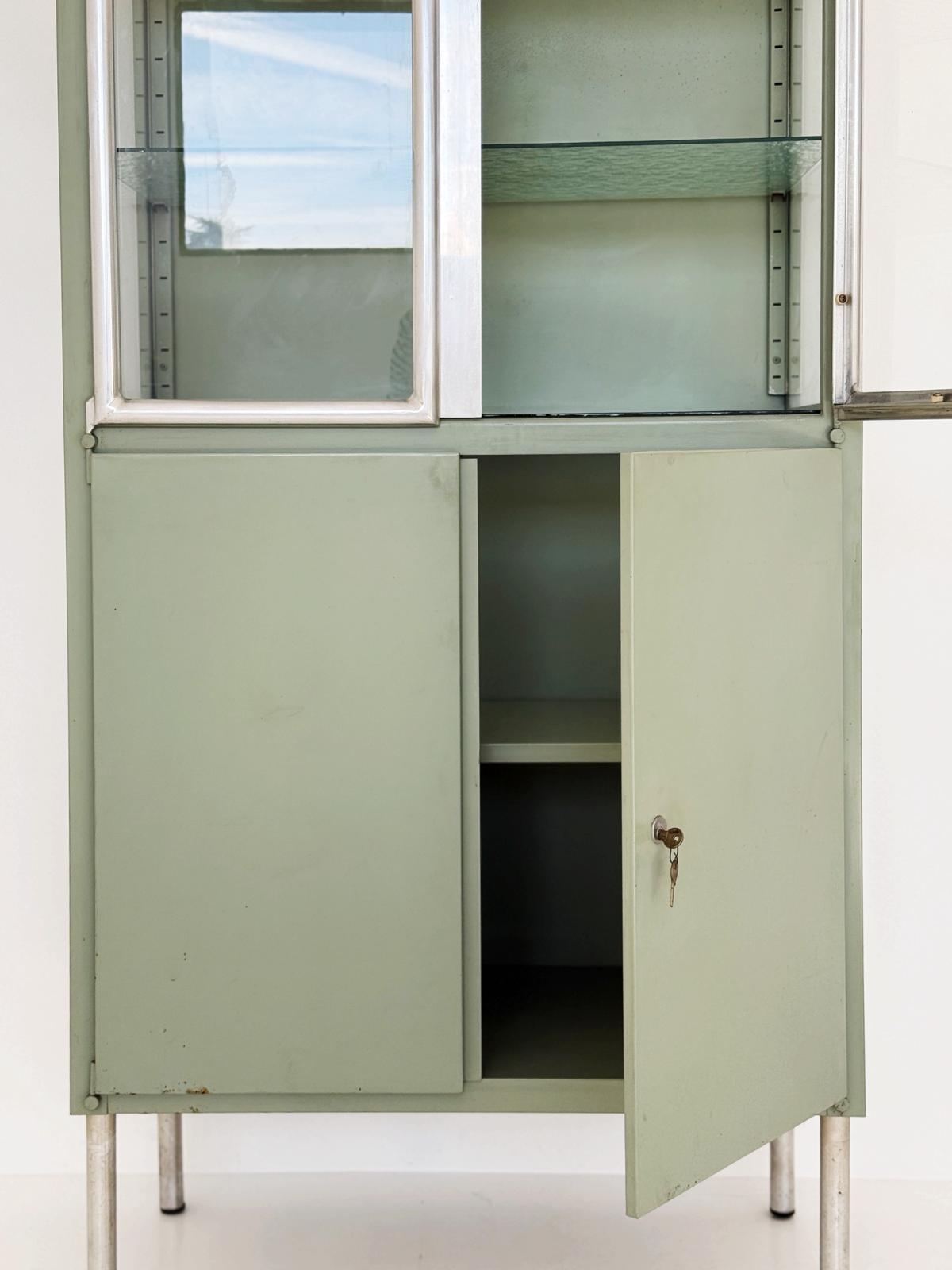 Sage green industrial display cabinet, 1950s