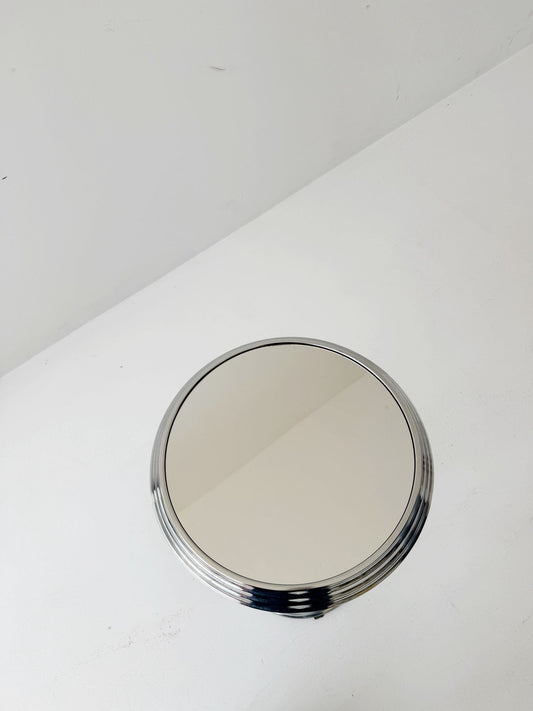 Chromed metal pedestal table with mirrored top