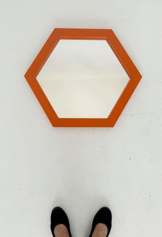 Vintage mirror with orange frame