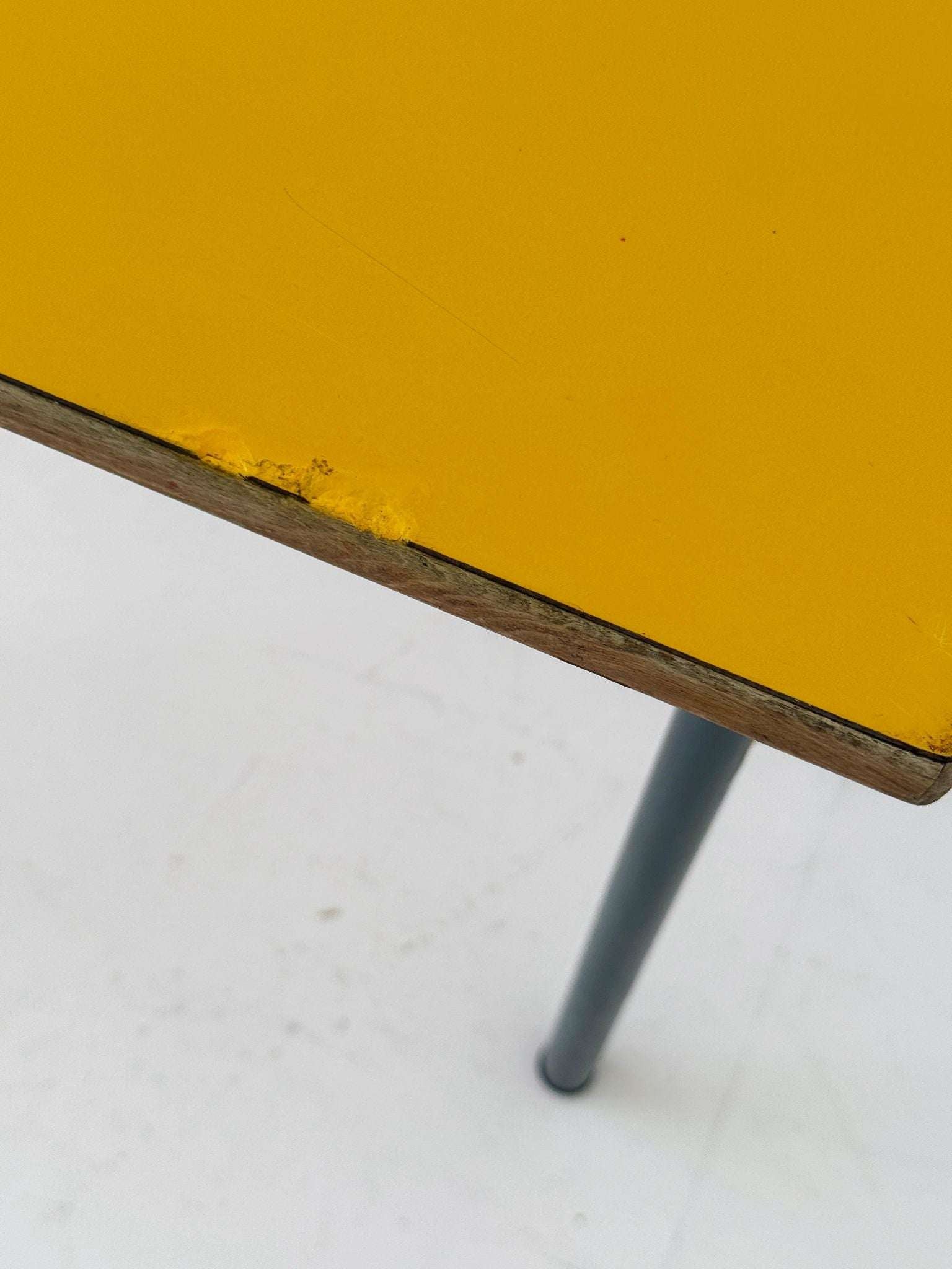 1960s coffee table with yellow top and metal frame