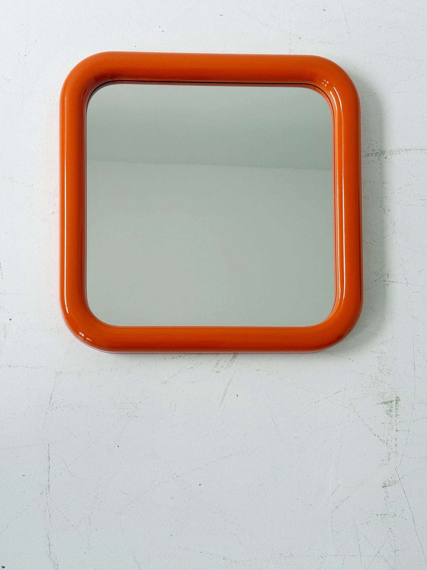 mirror with orange plastic frame - 1970s