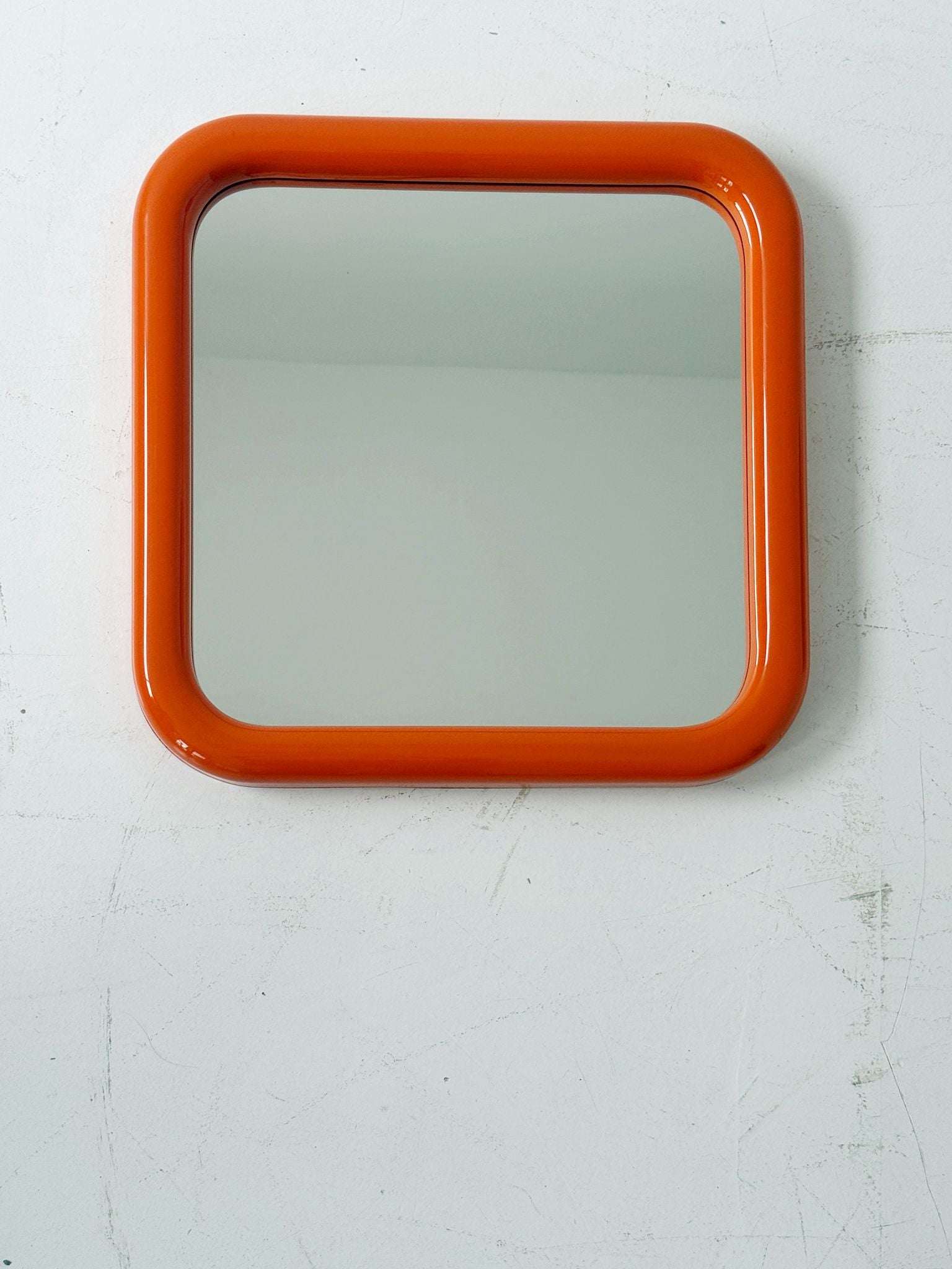 mirror with orange plastic frame - 1970s
