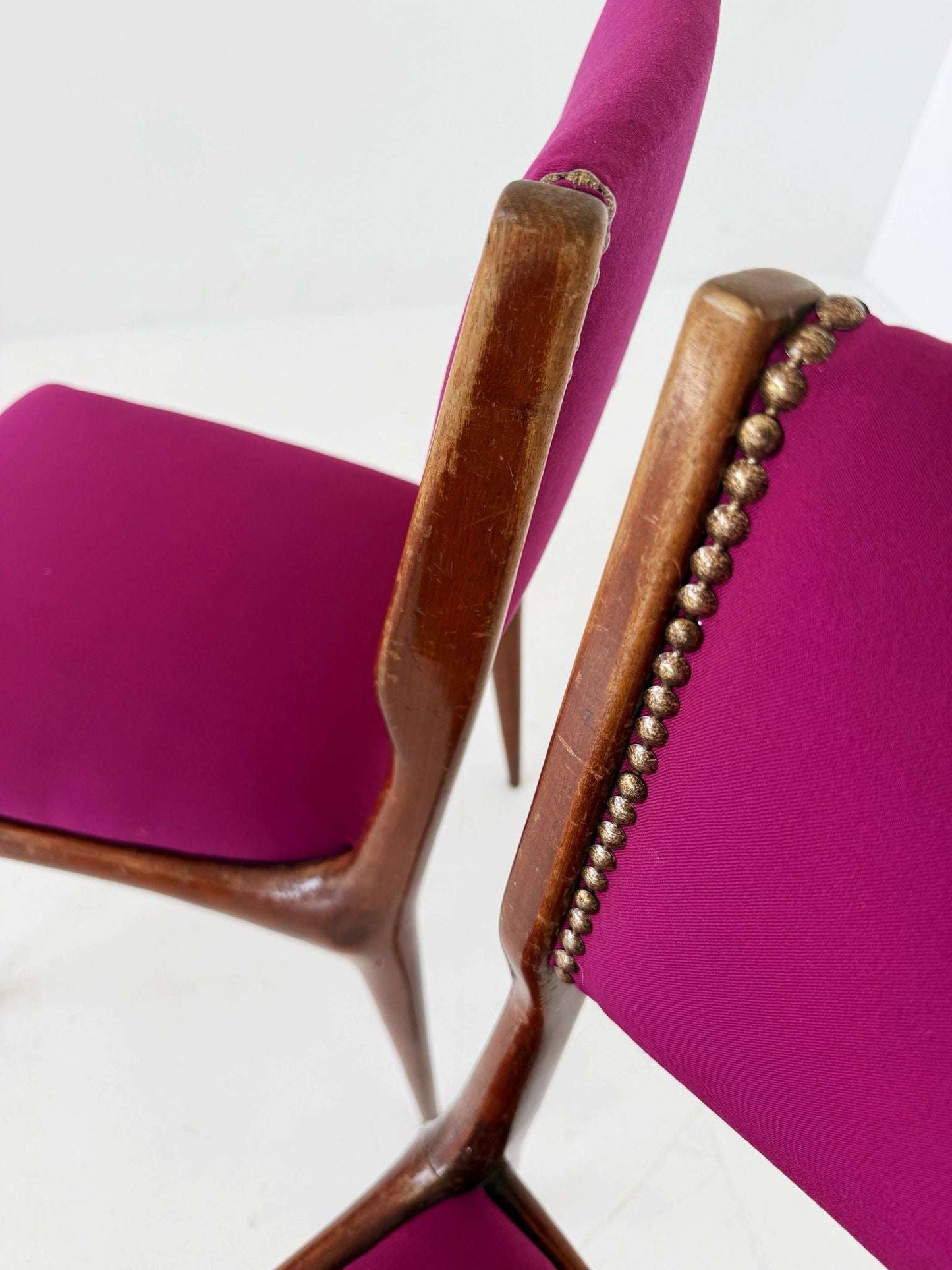Pair of 1950s Italian wooden chairs with fuchsia upholstery