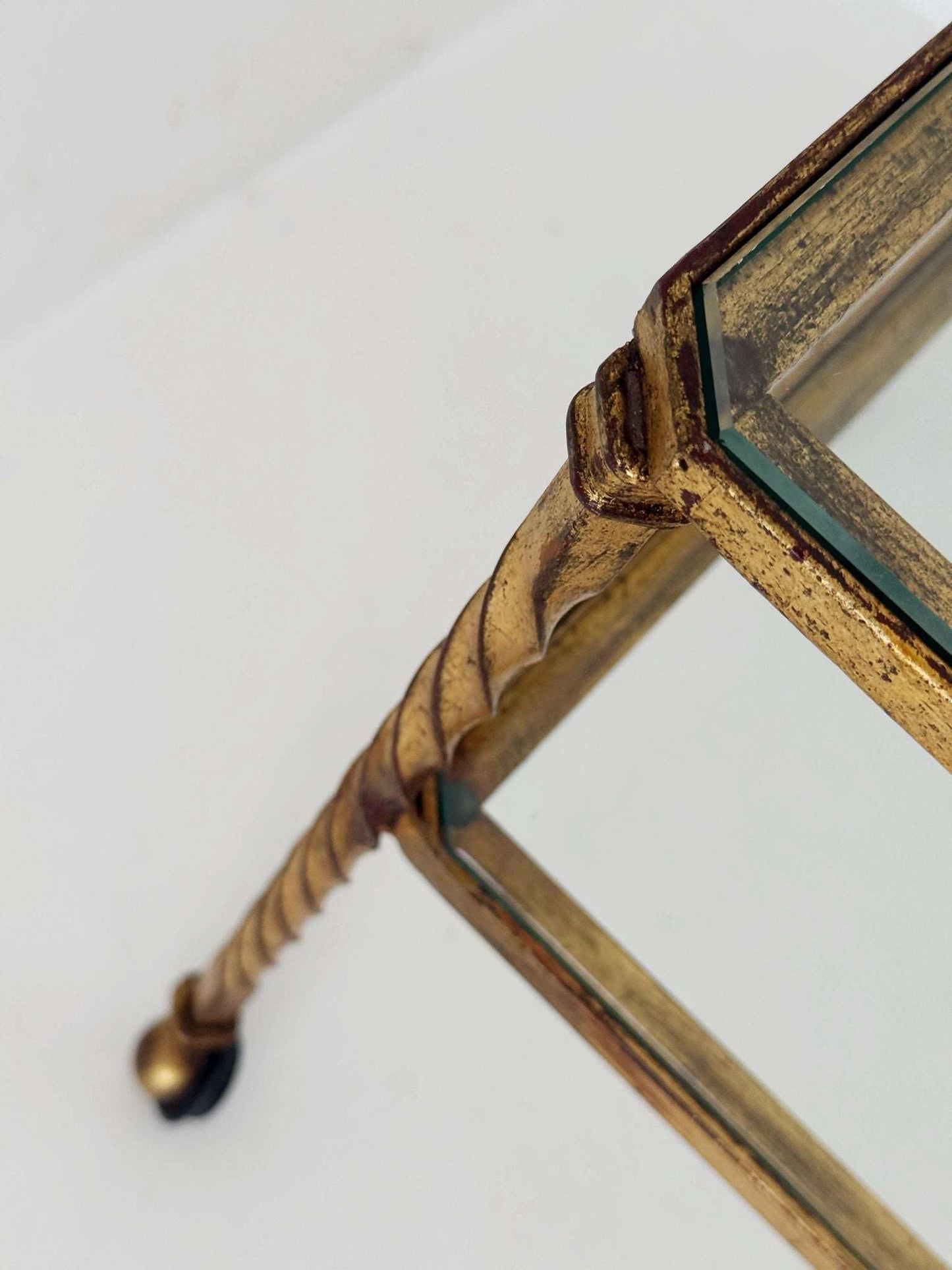 Gilded iron and glass coffee table, 1950s