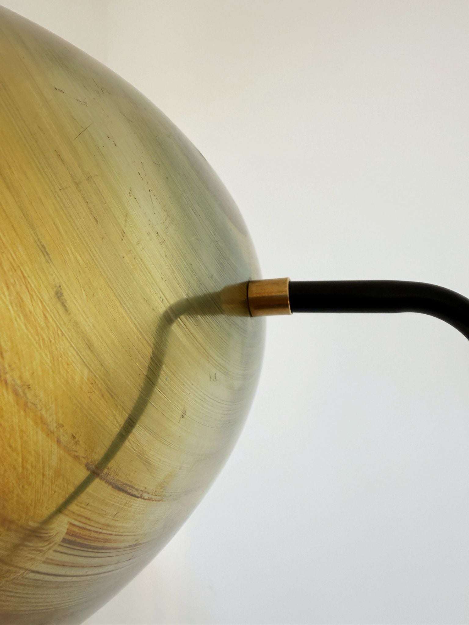 Contemporary floor lamp in brass and painted metal
