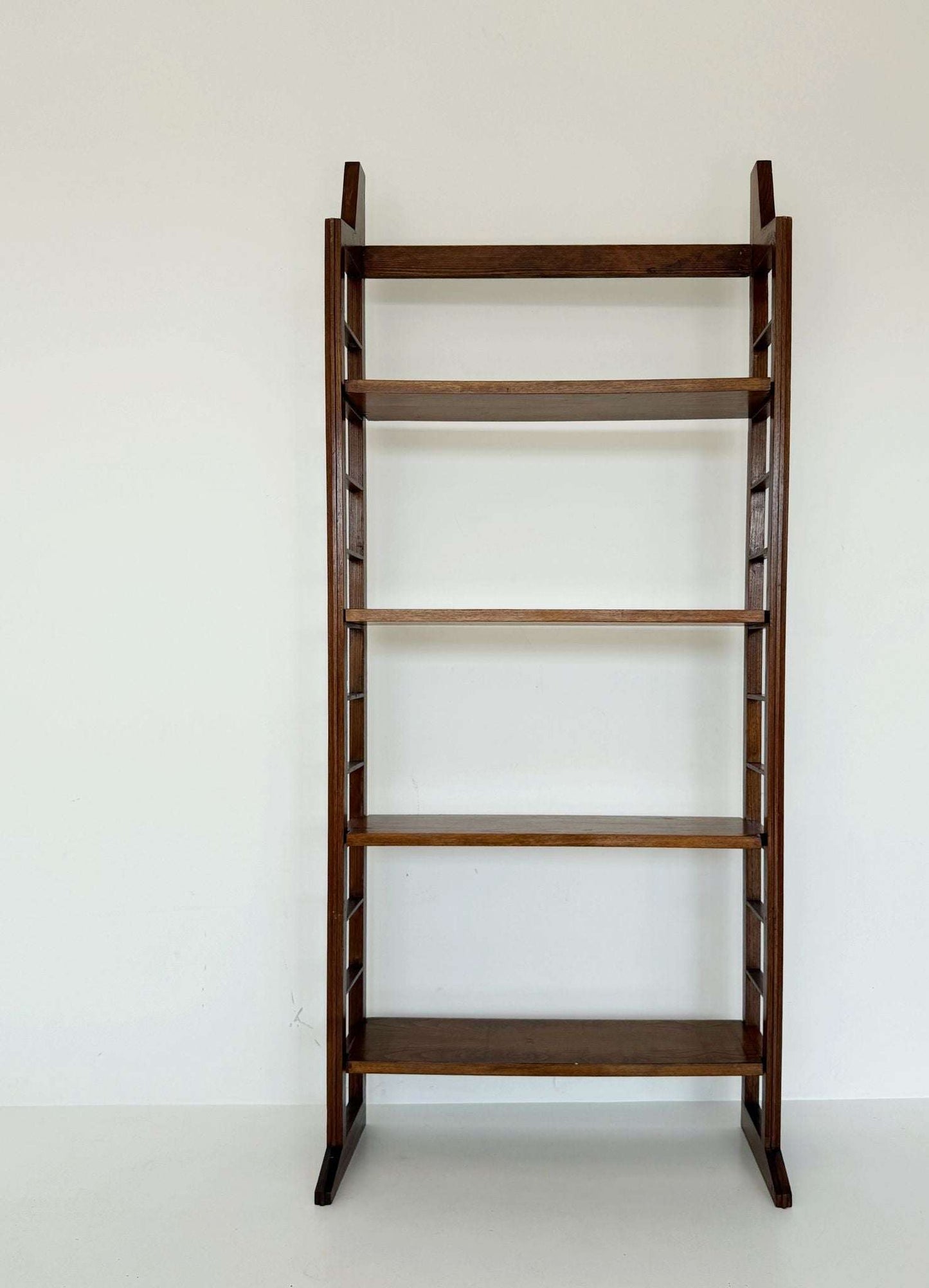 Modular wooden bookcase with removable shelves Italy, 1960s–1970s