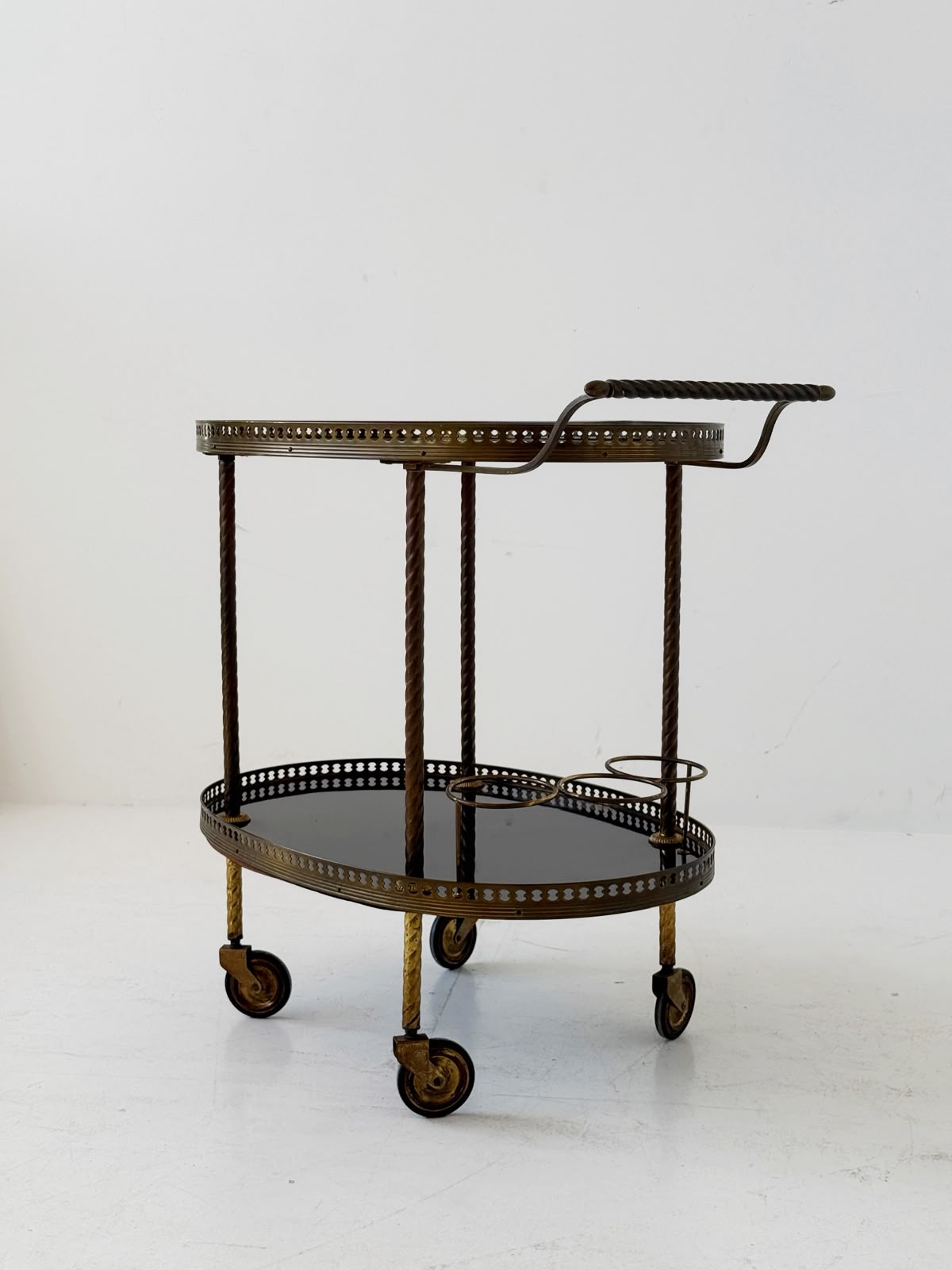 Oval brass and lacquered wood bar cart, 1950s/60s